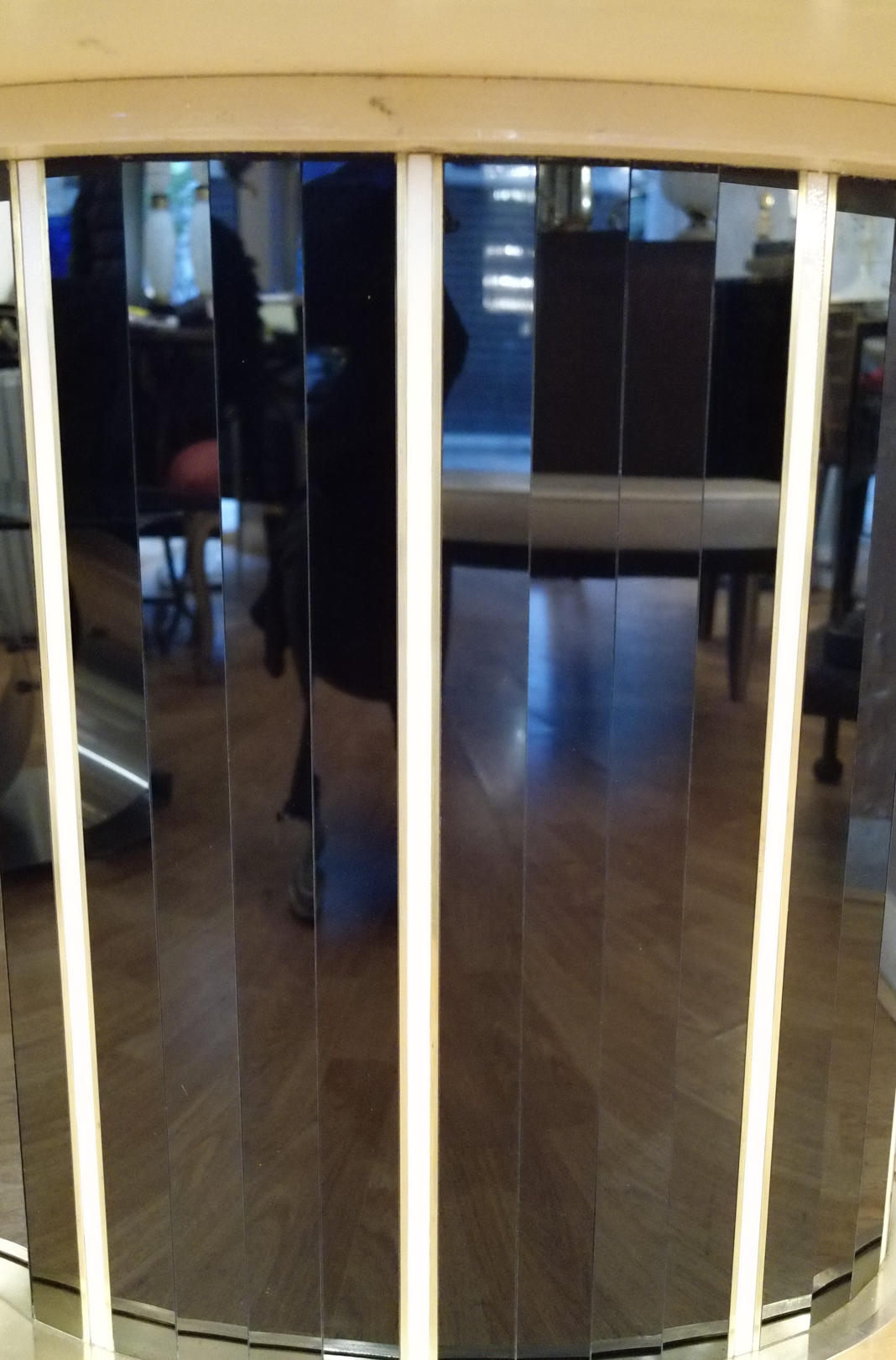 Console in black and cream tinted glass