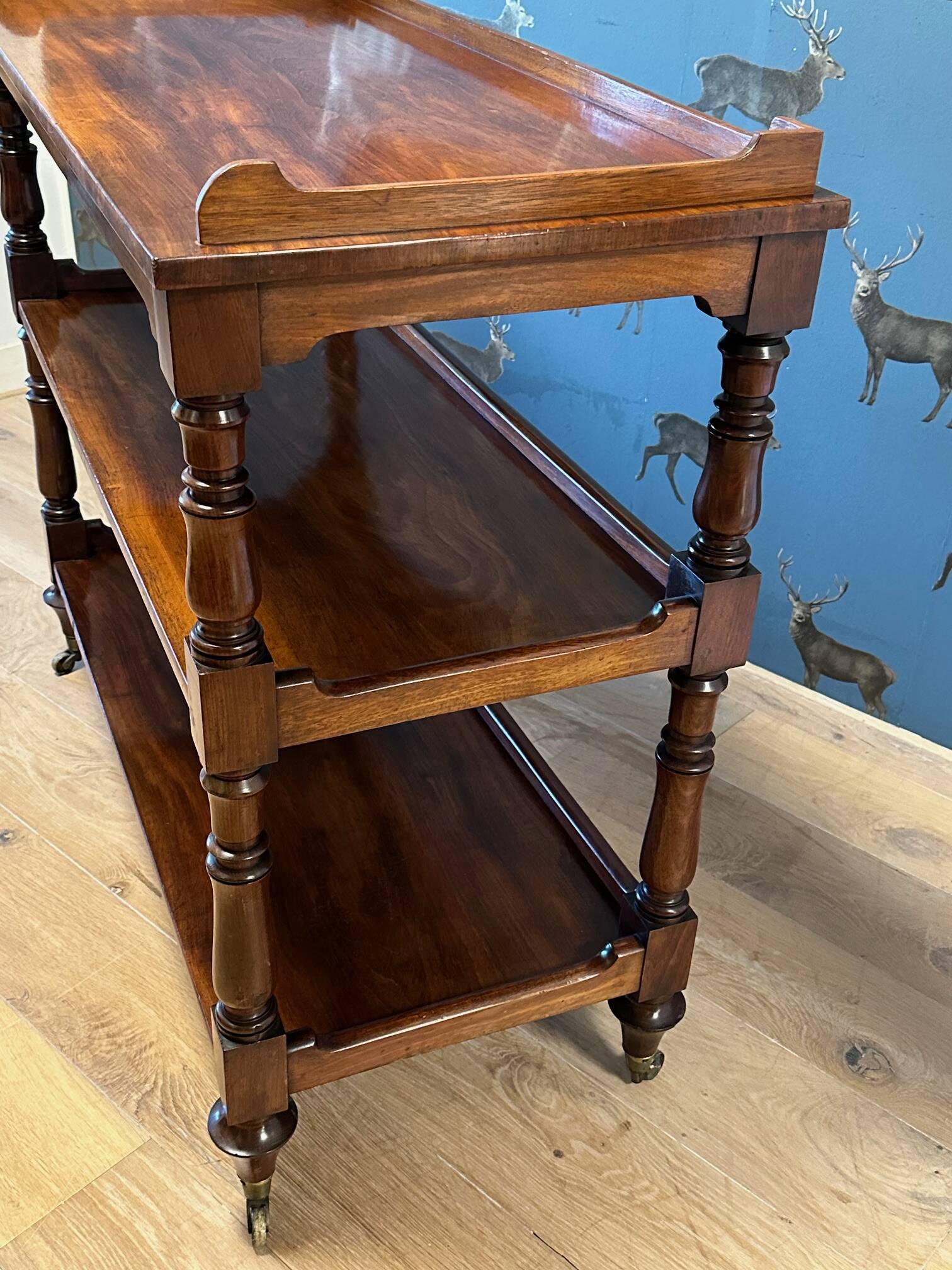 antique mahogany three-tiered étagère