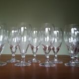 Eight champagne flutes in engraved glass