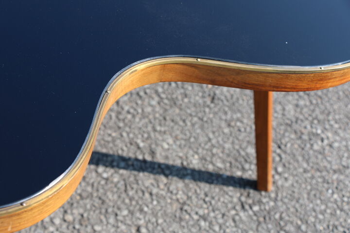 Bean coffee table with black glass top