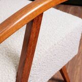 Vintage armchair in pearl white bouclé with walnut wood, 1960.