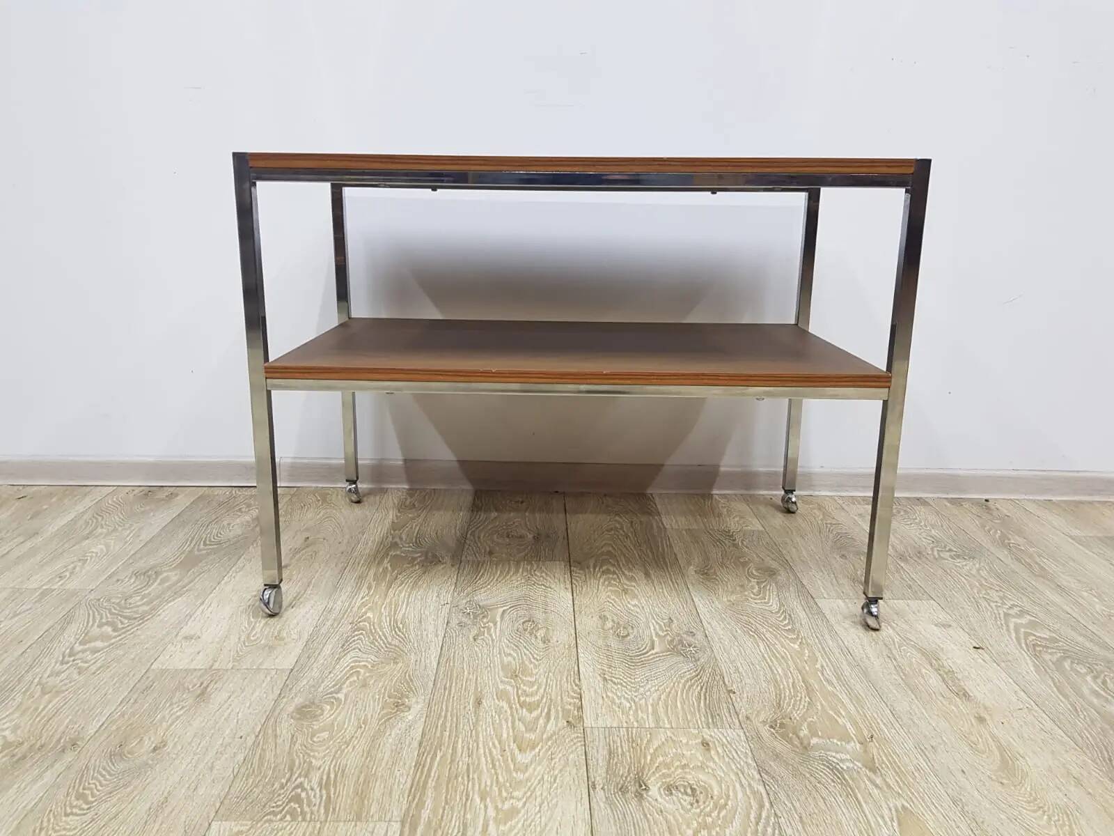Mobile side table, brown, veneer, chrome-plated steel, Germany, 1970s.