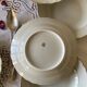 6 antique off-white porcelain soup plates with gold rim from Limoges