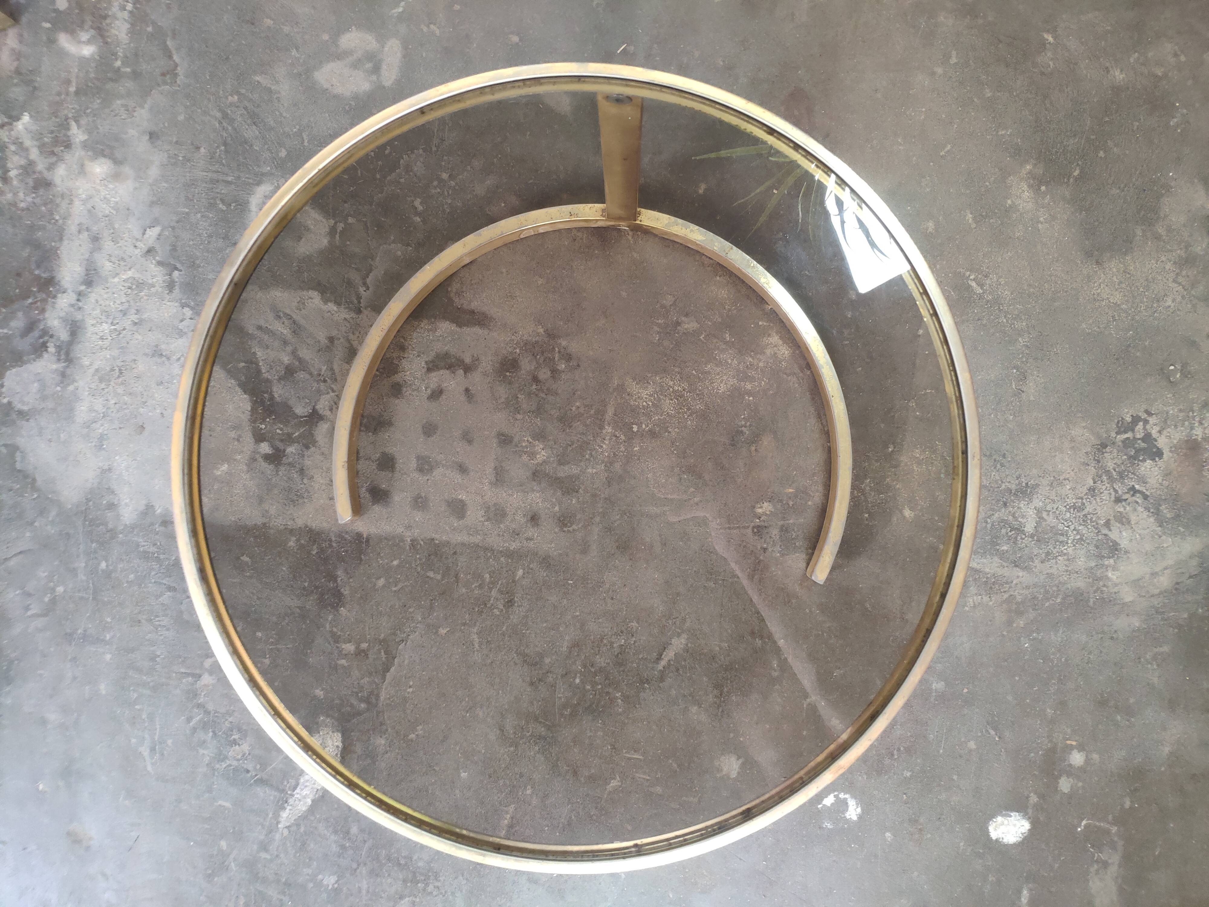Superb trundle table round golden and smoked glass