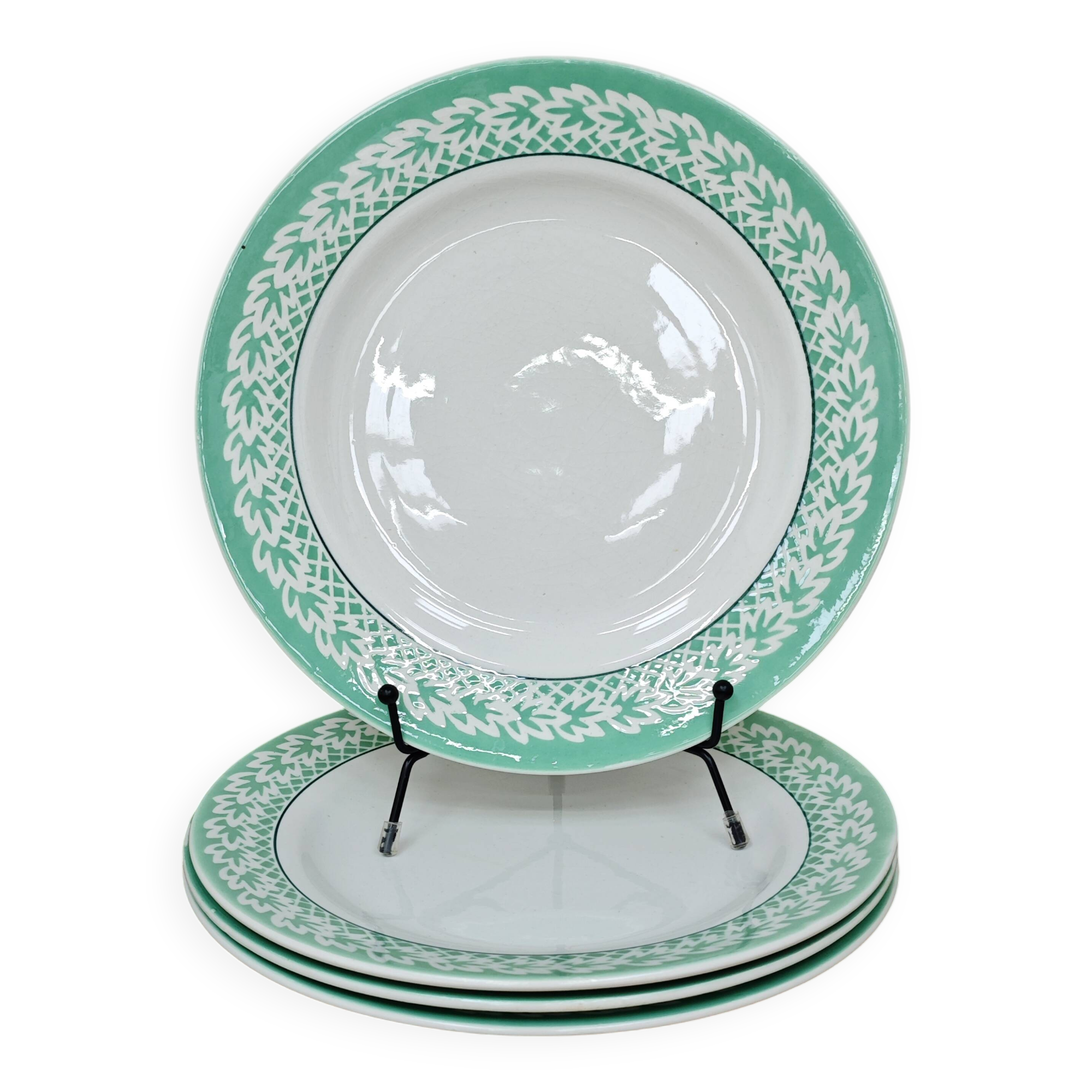 Set of 4 KIFO L'Amandinoise flat plates with green leaf design.