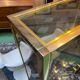 Exhibition showcase in gold-plated chrome and smoked glass - work from the 1980s.