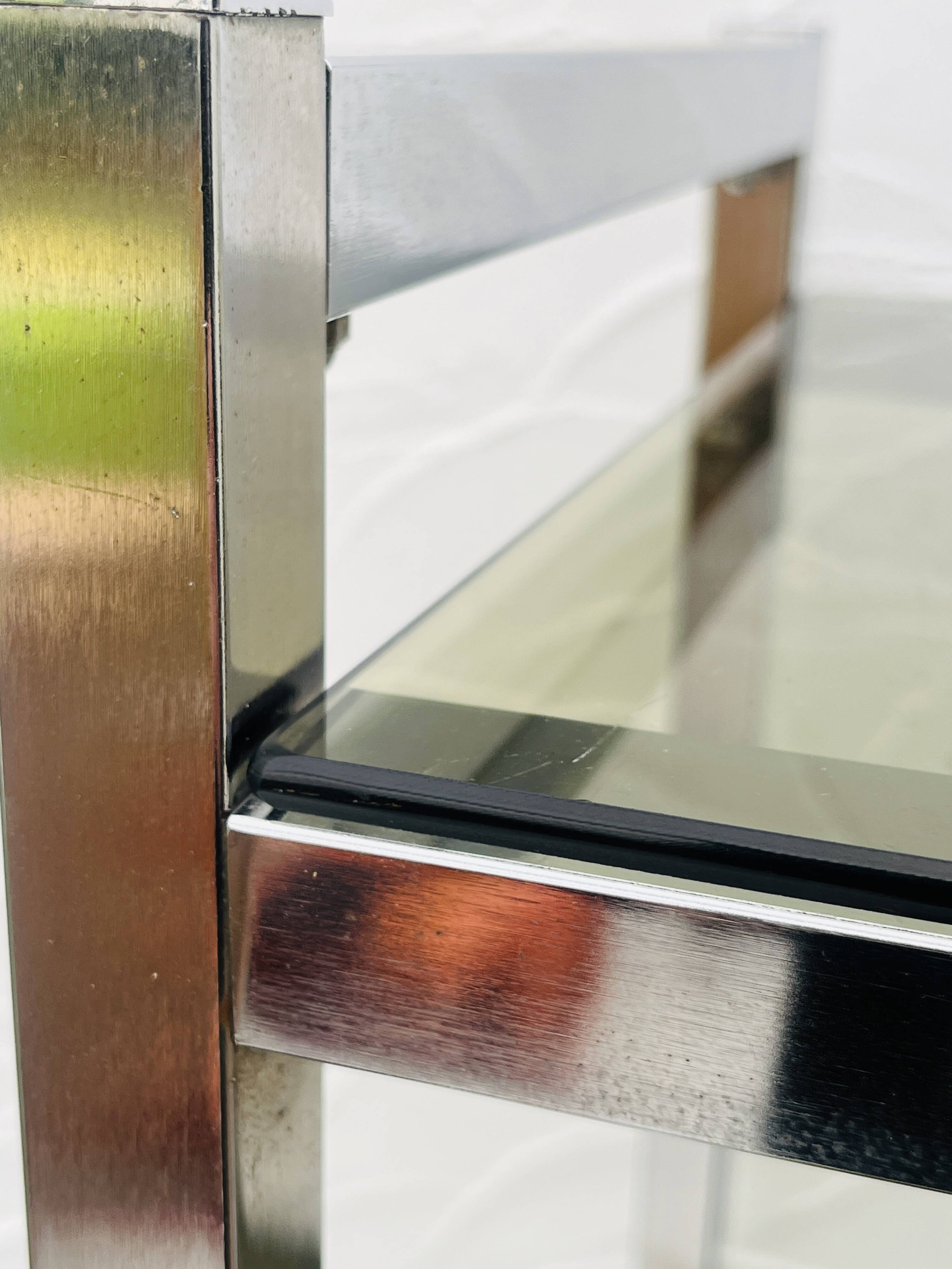Vintage Italian design shelf in chrome and smoked glass from the 1970s.