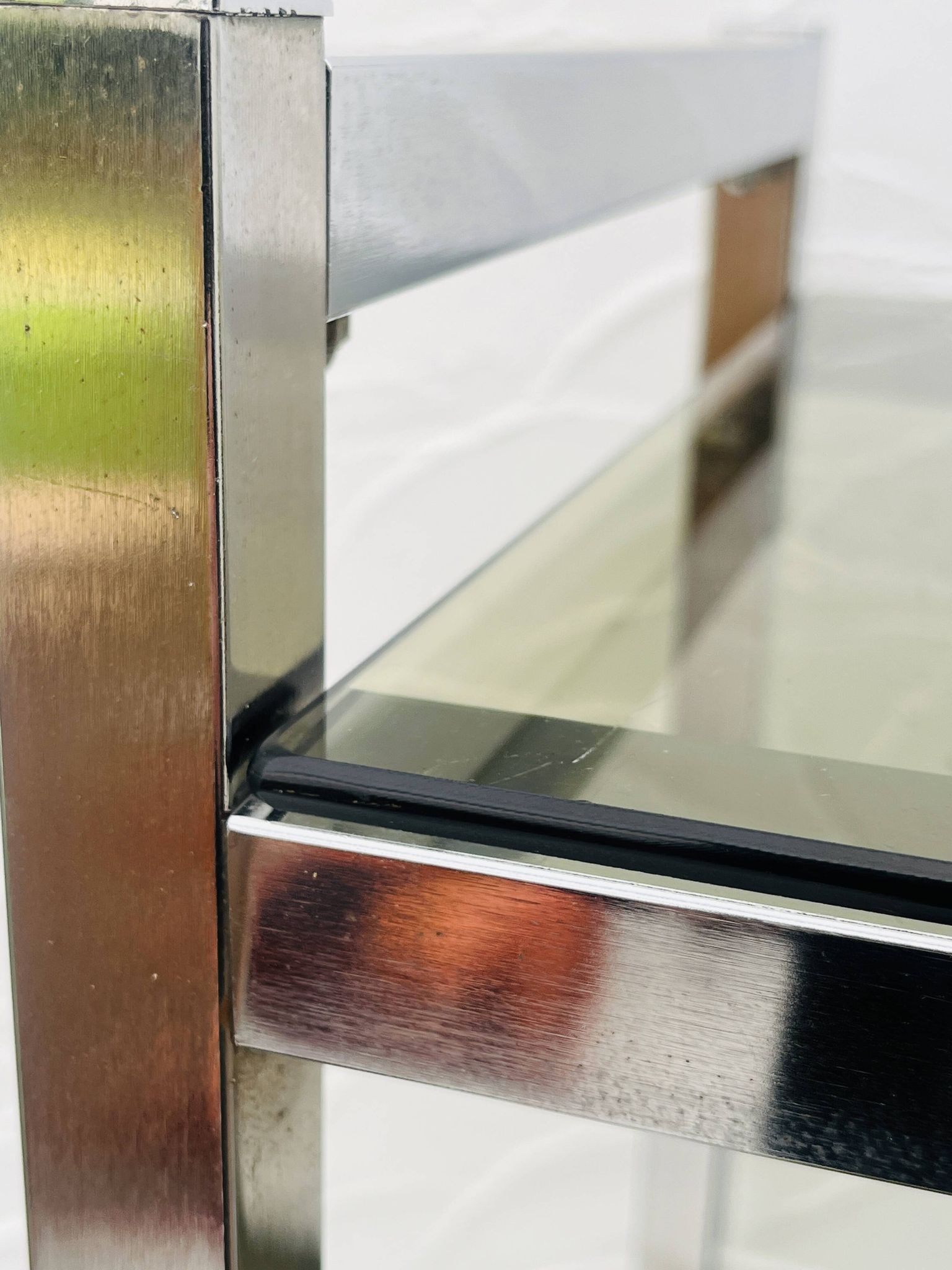 Vintage Italian design shelf in chrome and smoked glass from the 1970s.