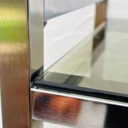 Vintage Italian design shelf in chrome and smoked glass from the 1970s.