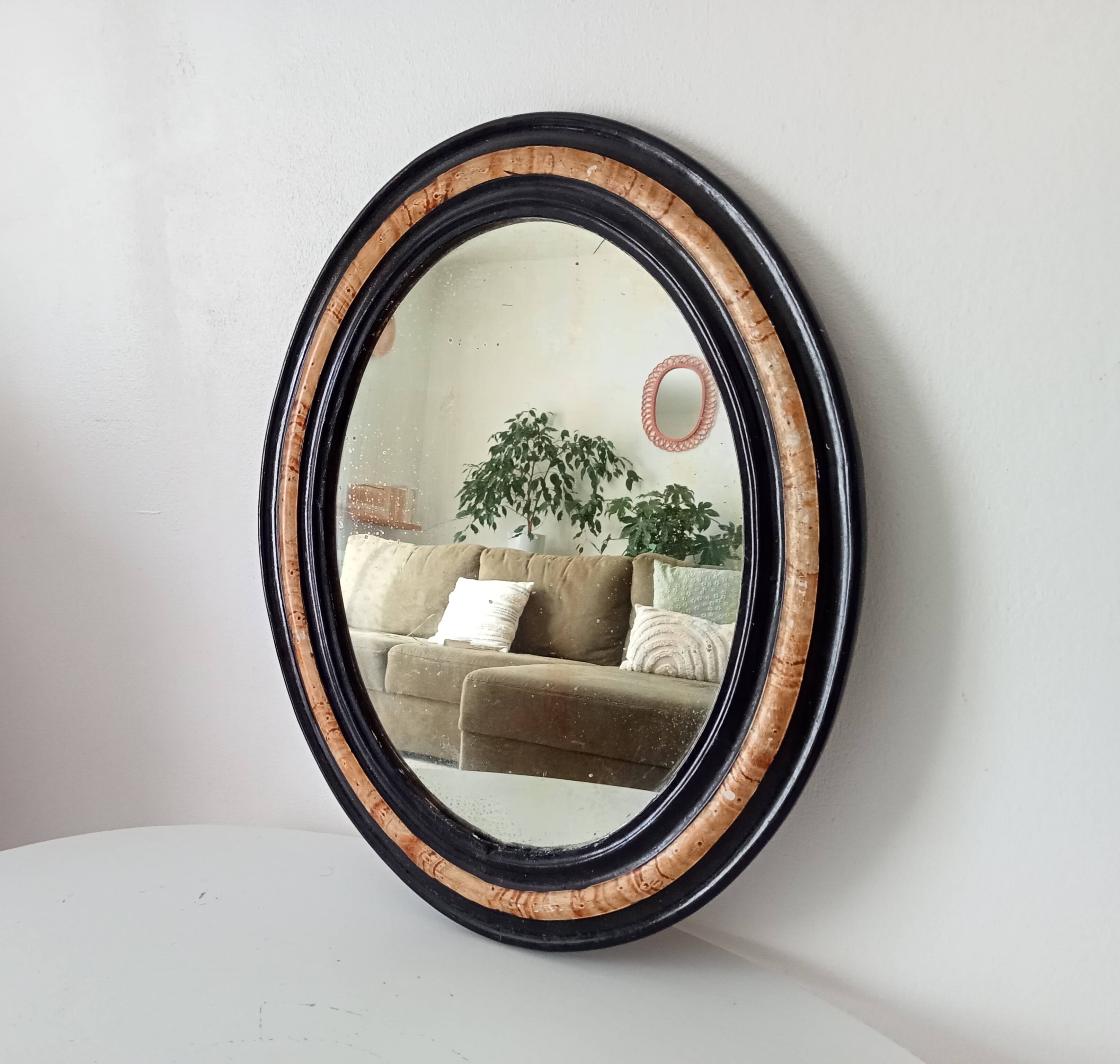 19th-century antique mirror in wood and stucco.