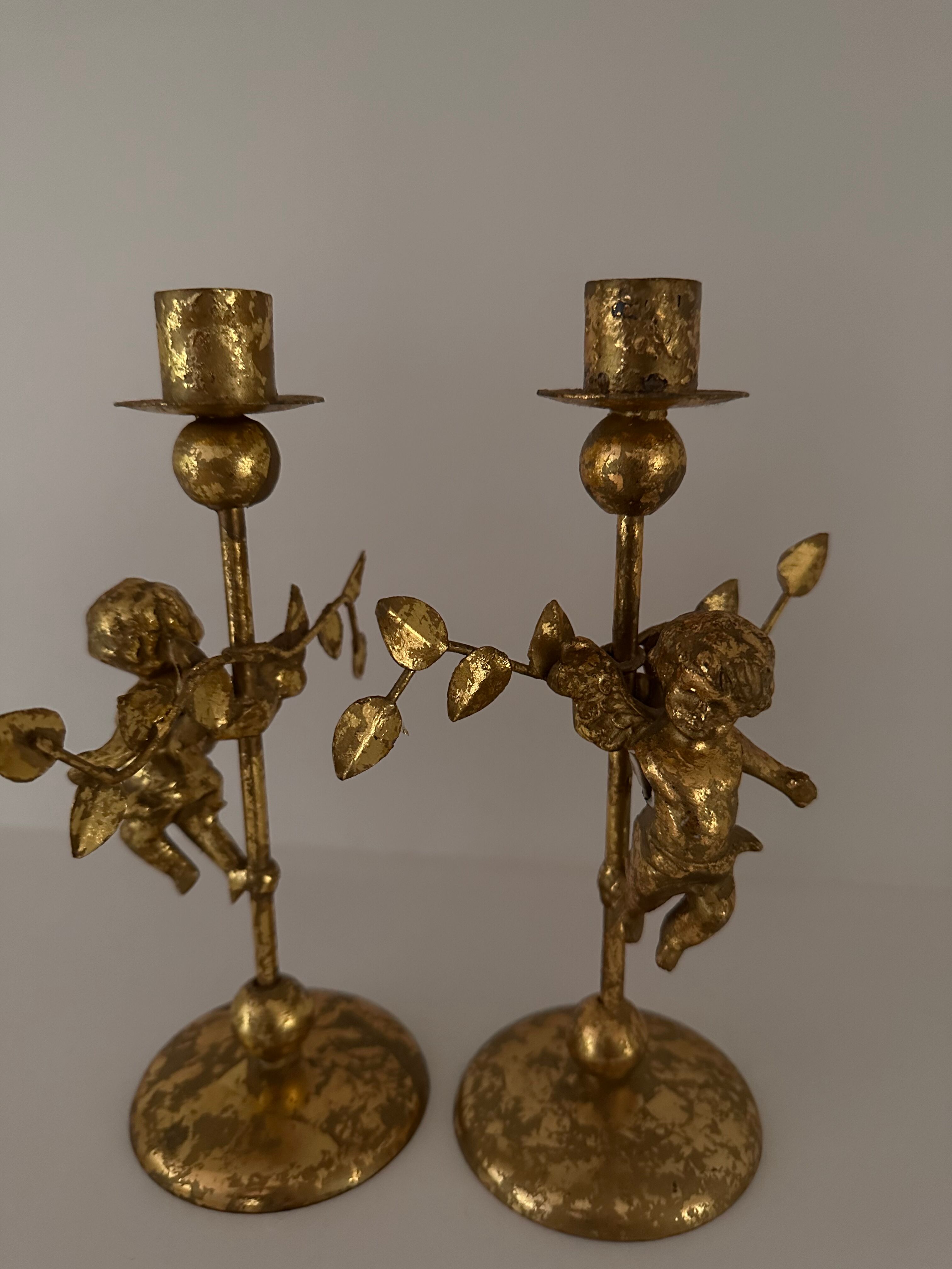 2 golden candlesticks "cherubs"