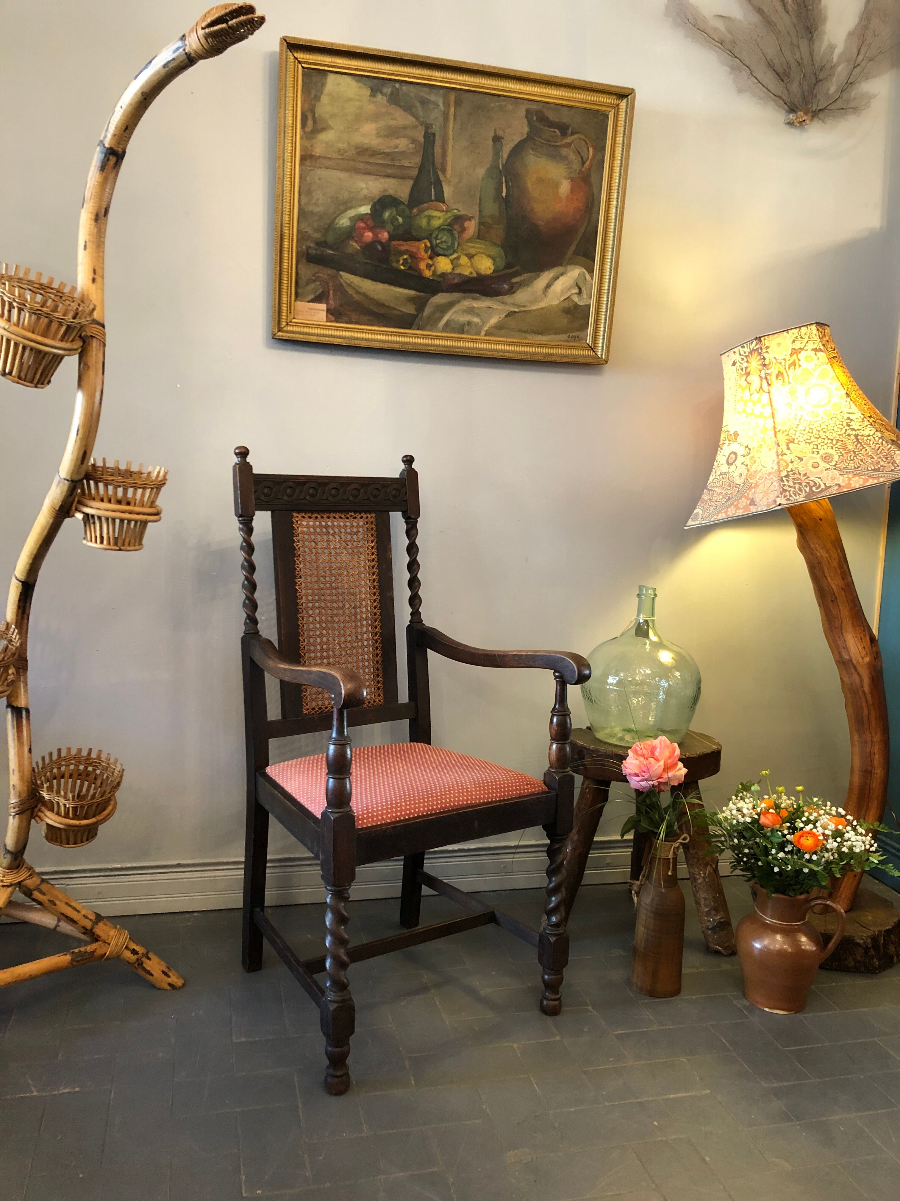 Carved wooden armchair and cannage