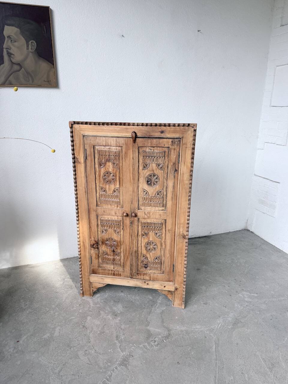 Small cabinet in folk art style