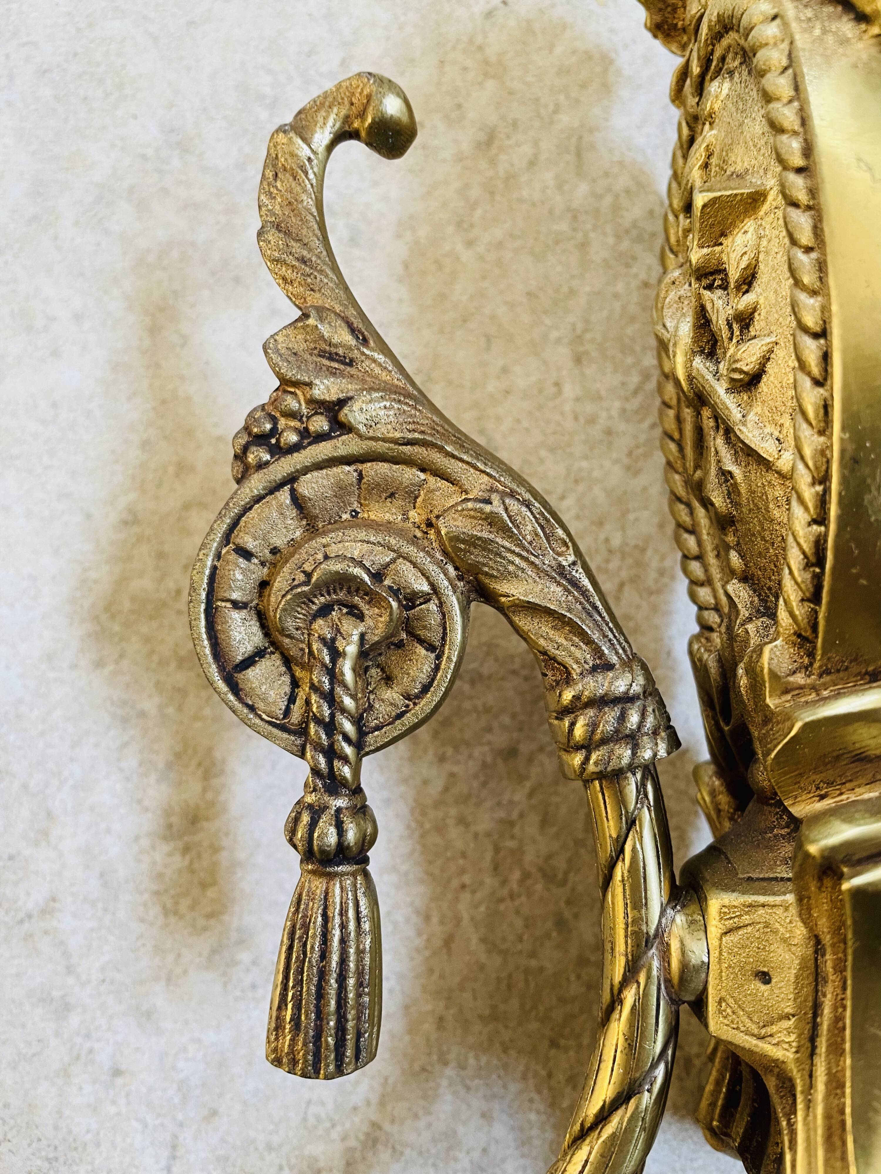 Pair of gilded bronze wall lamps Louis XVI style