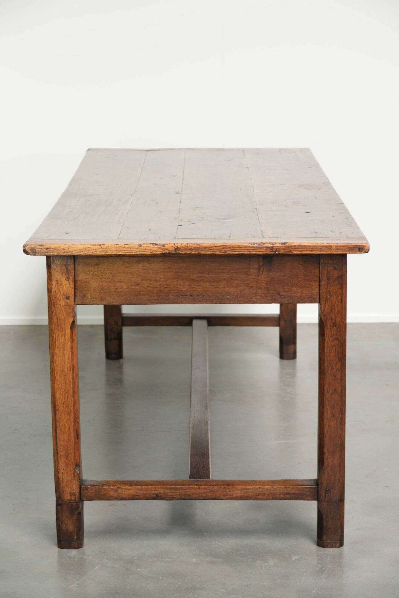 18th century French farmhouse dining table made of oak and fruitwood