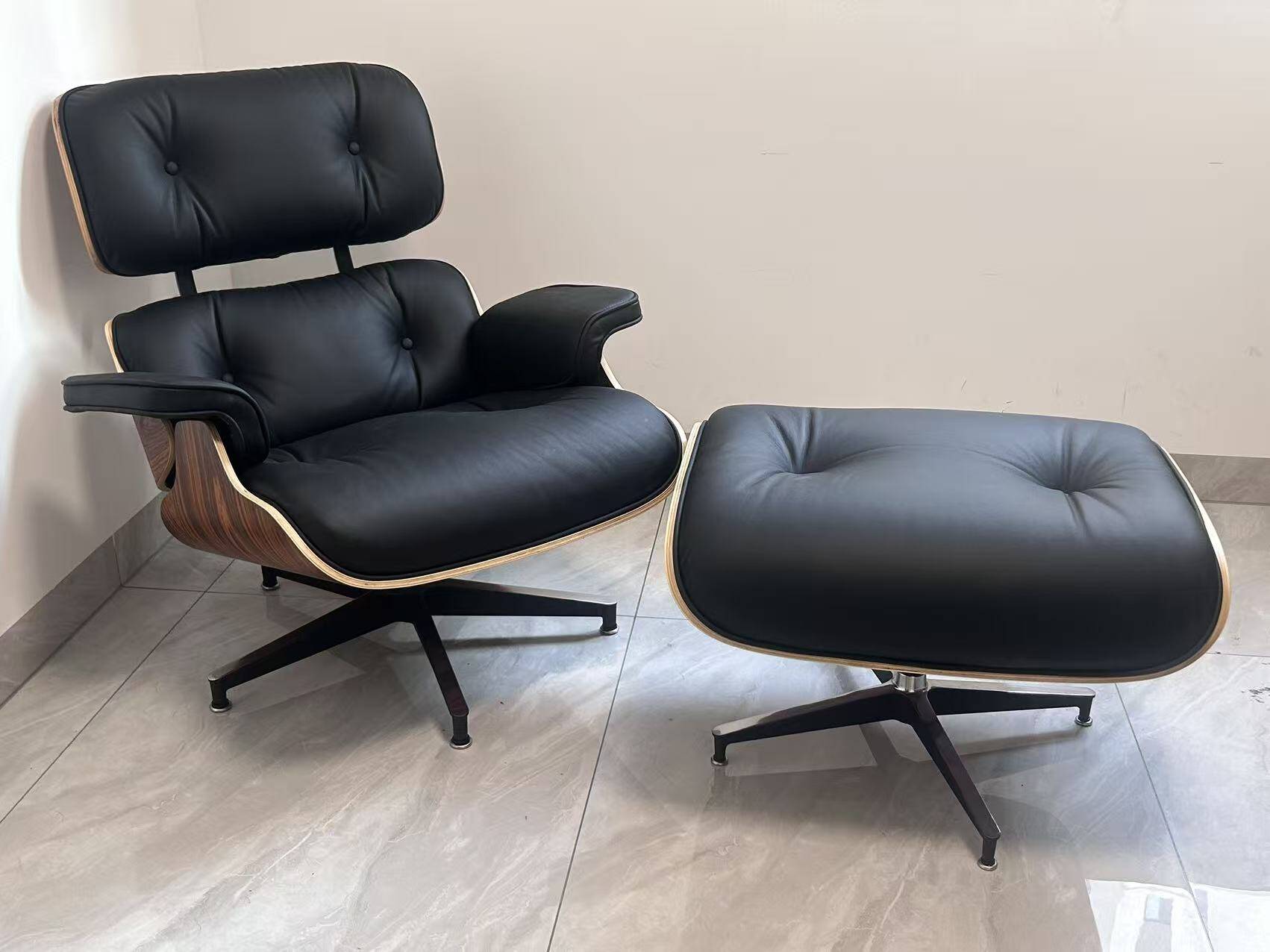 Lounge chair and ottoman by Herman Miller Charles & Ray Eames, rosewood.