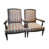 Pair of Louis XVI style walnut armchairs