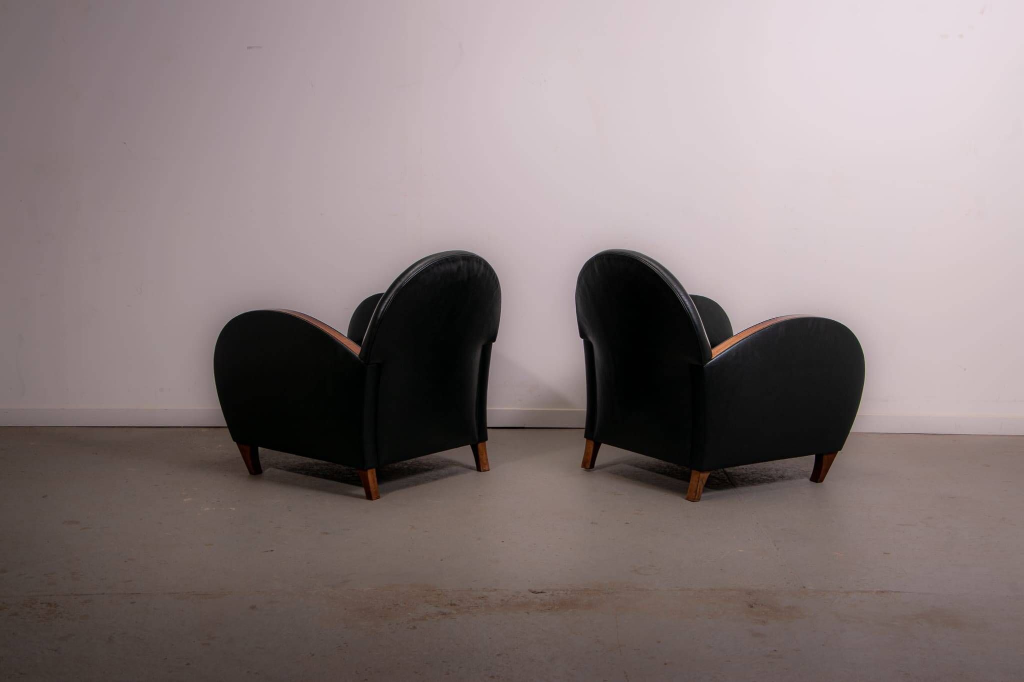 Pair of mid-century leather armchairs, circa 1970, made in Belgium.