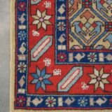 Colorful oriental runner with contrasting borders and cozy patterns, measuring 314x92 cm
