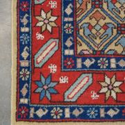 Colorful oriental runner with contrasting borders and cozy patterns, measuring 314x92 cm