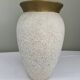 Cream speckled glazed vase with a gold rim, 1970s.