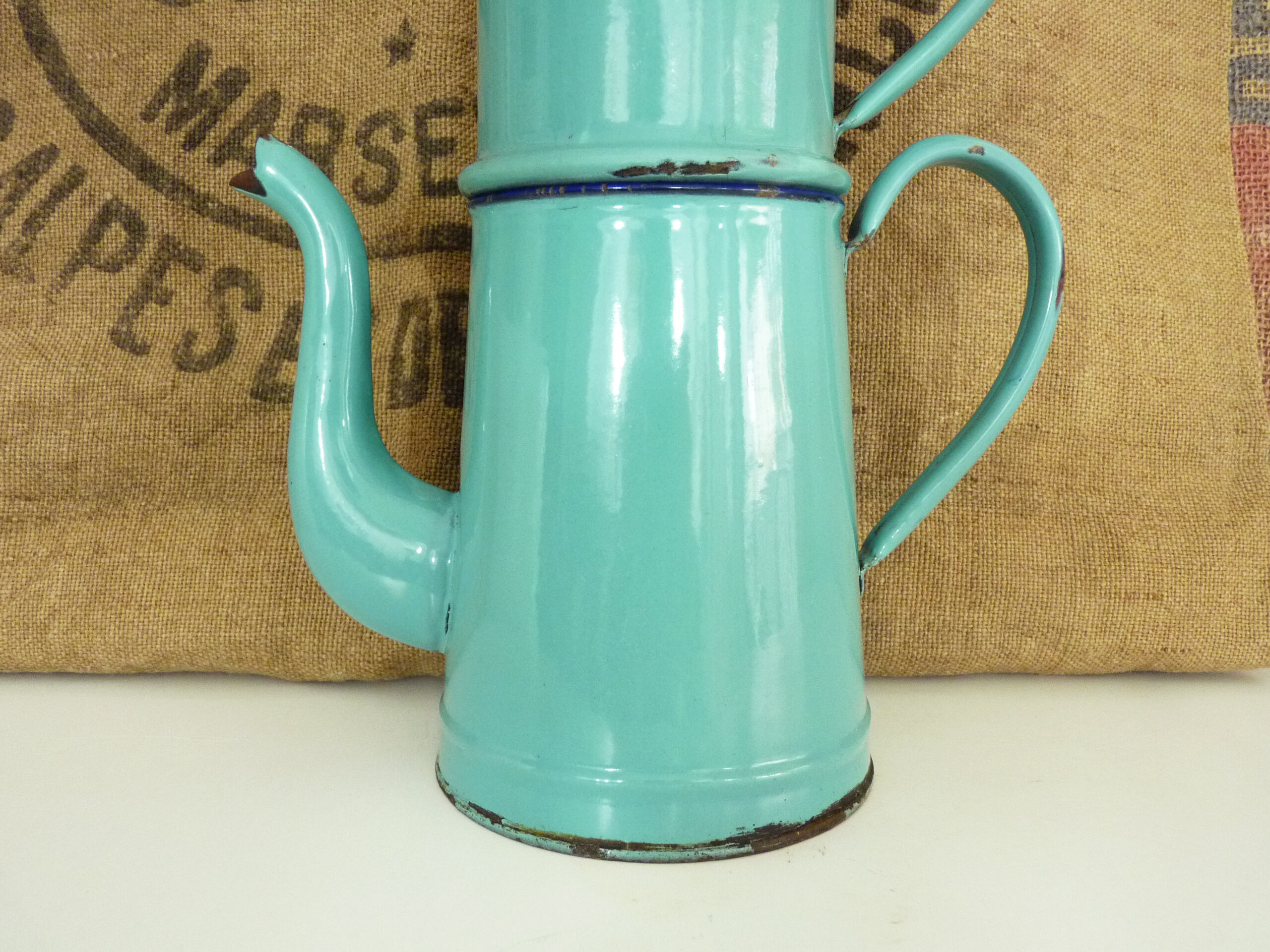 Old coffee maker in pastel blue enamelled sheet