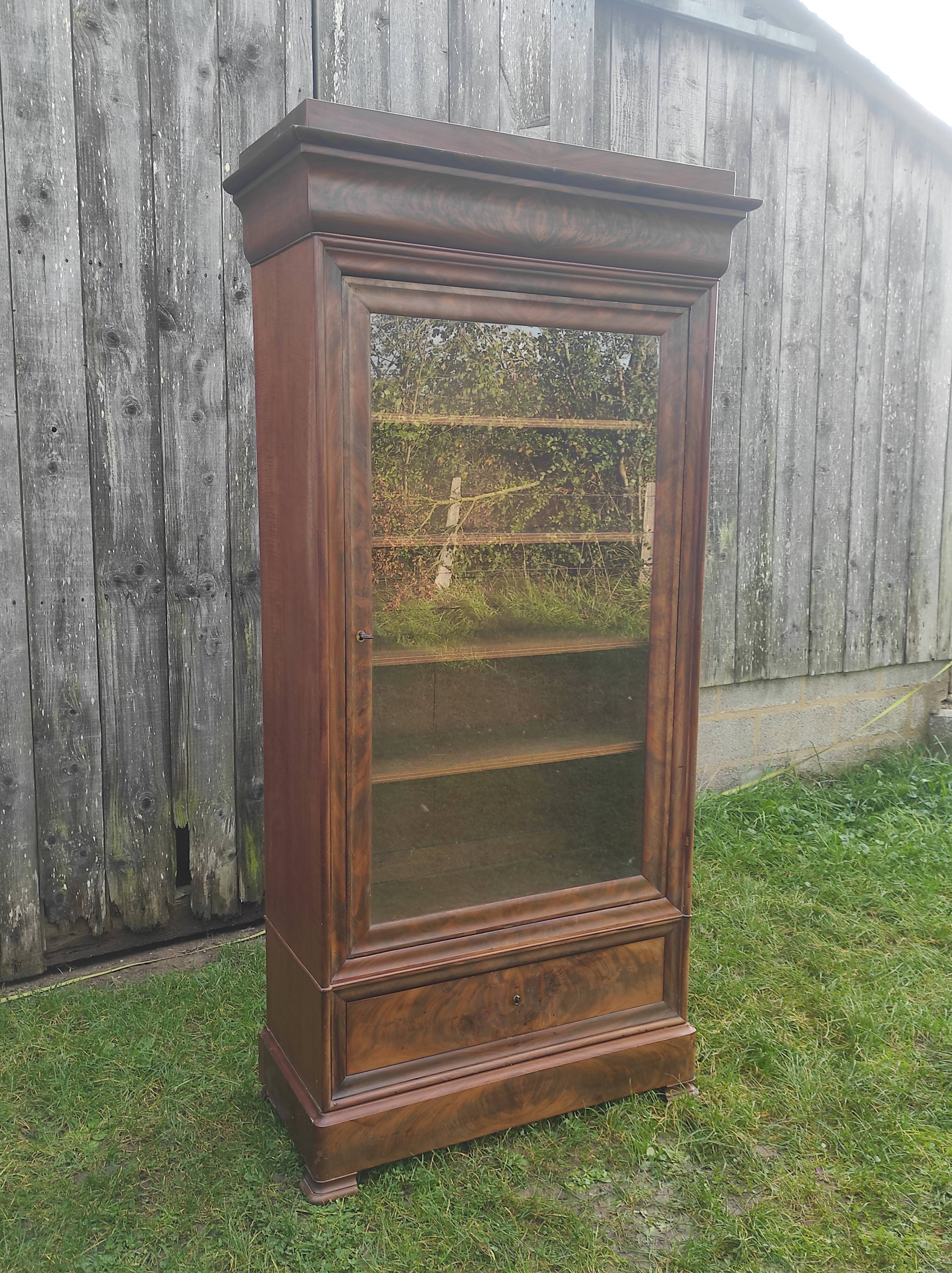 Parisian glass cabinet.