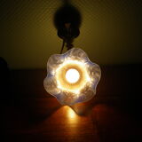 Wall sconces with opalines in the shape of corollas and black metal support
