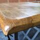 Table basse ou bout de canapé faisant porte-revues  en chêne et fer forgé