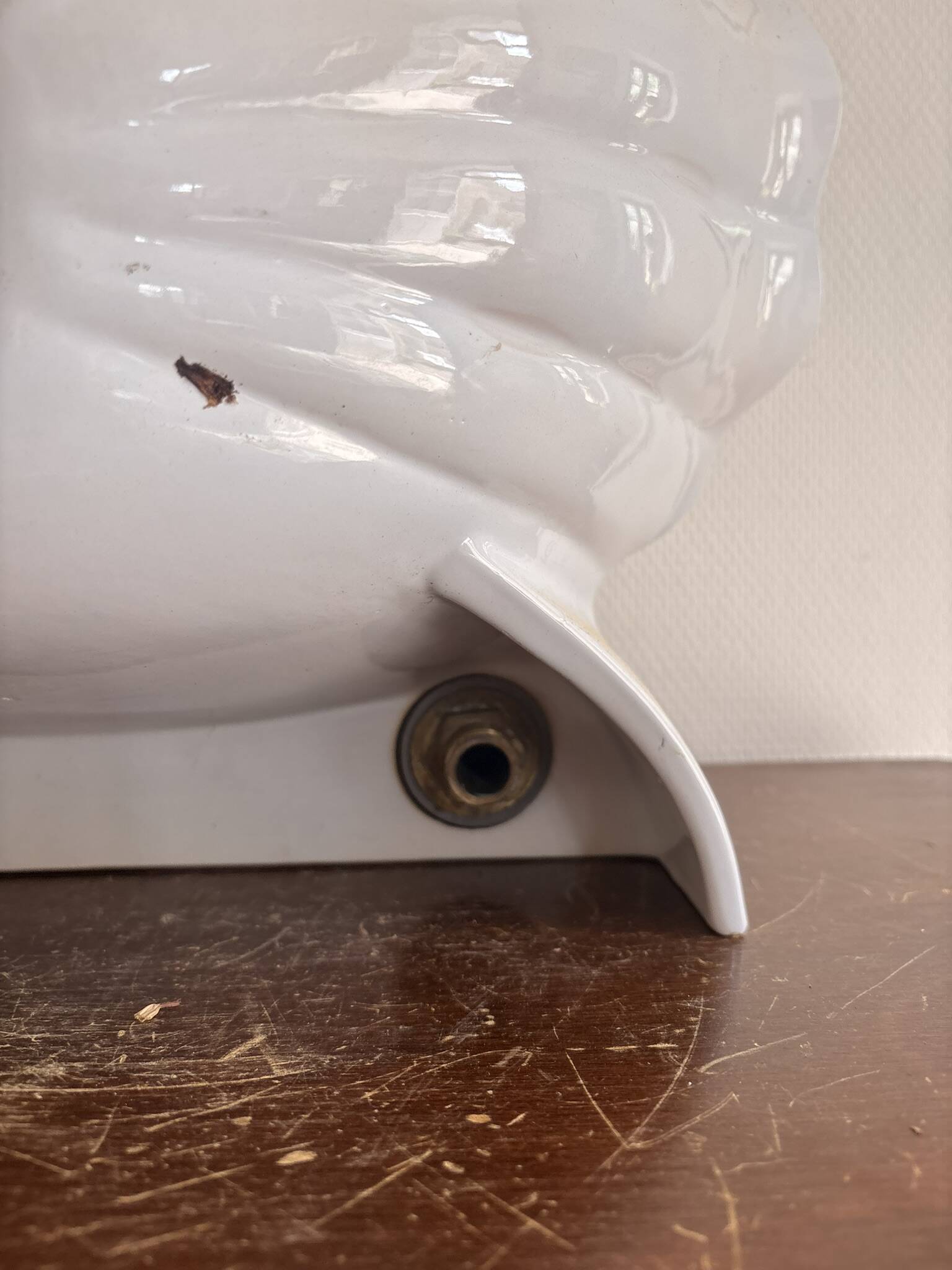 Wall-mounted washbasin shell-shaped, enamelled earthenware by Maurice Herb.
