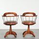 Set of 2 swivel/office chairs with a cognac-coloured cow leather seat