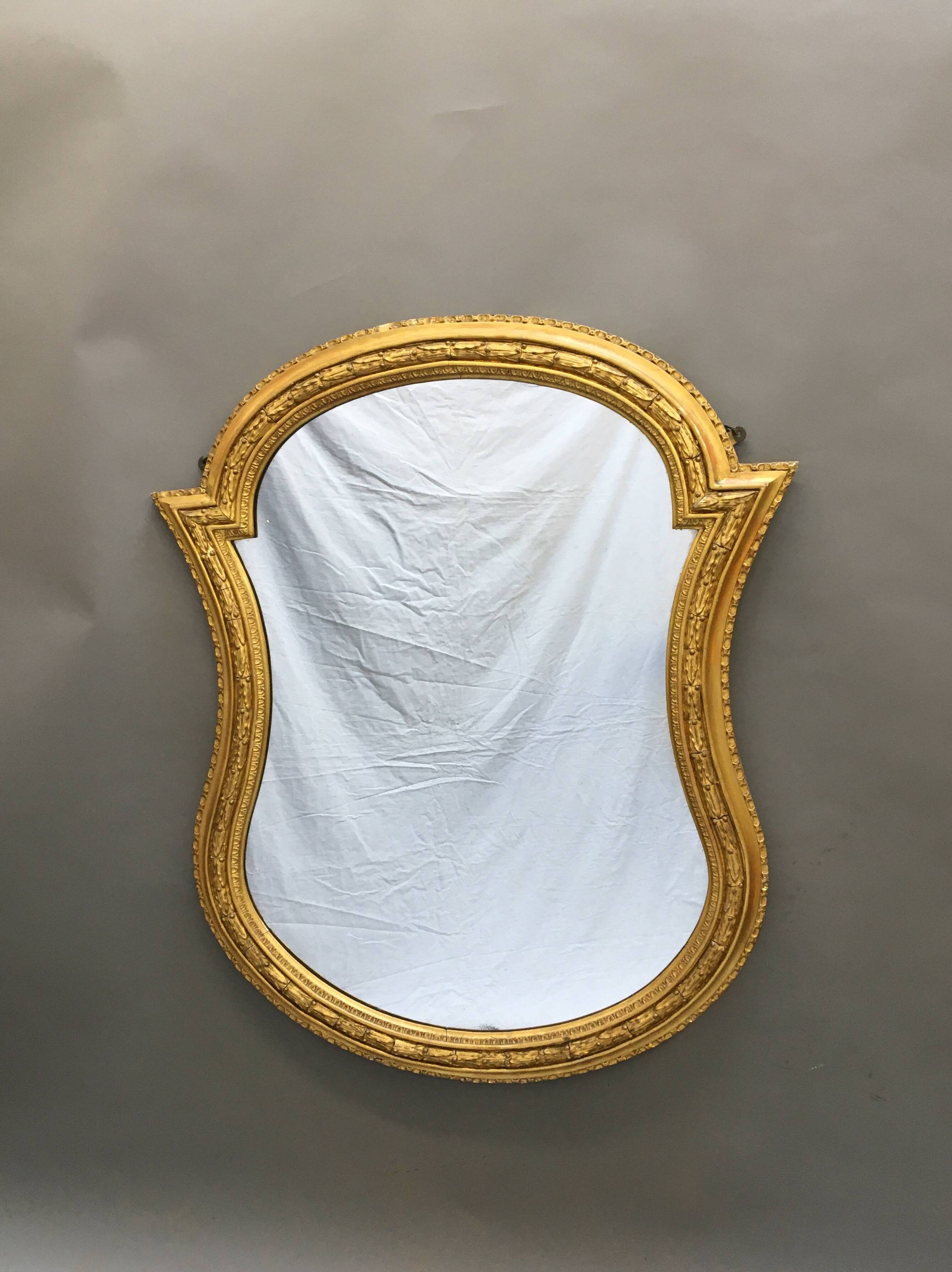 Grand miroir doré du 19ème