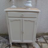 Small buffet, reimagined storage unit in beige.