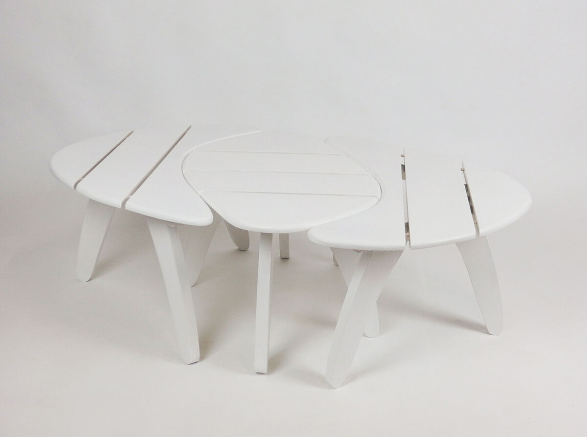 Three garden coffee tables by Huguonnet