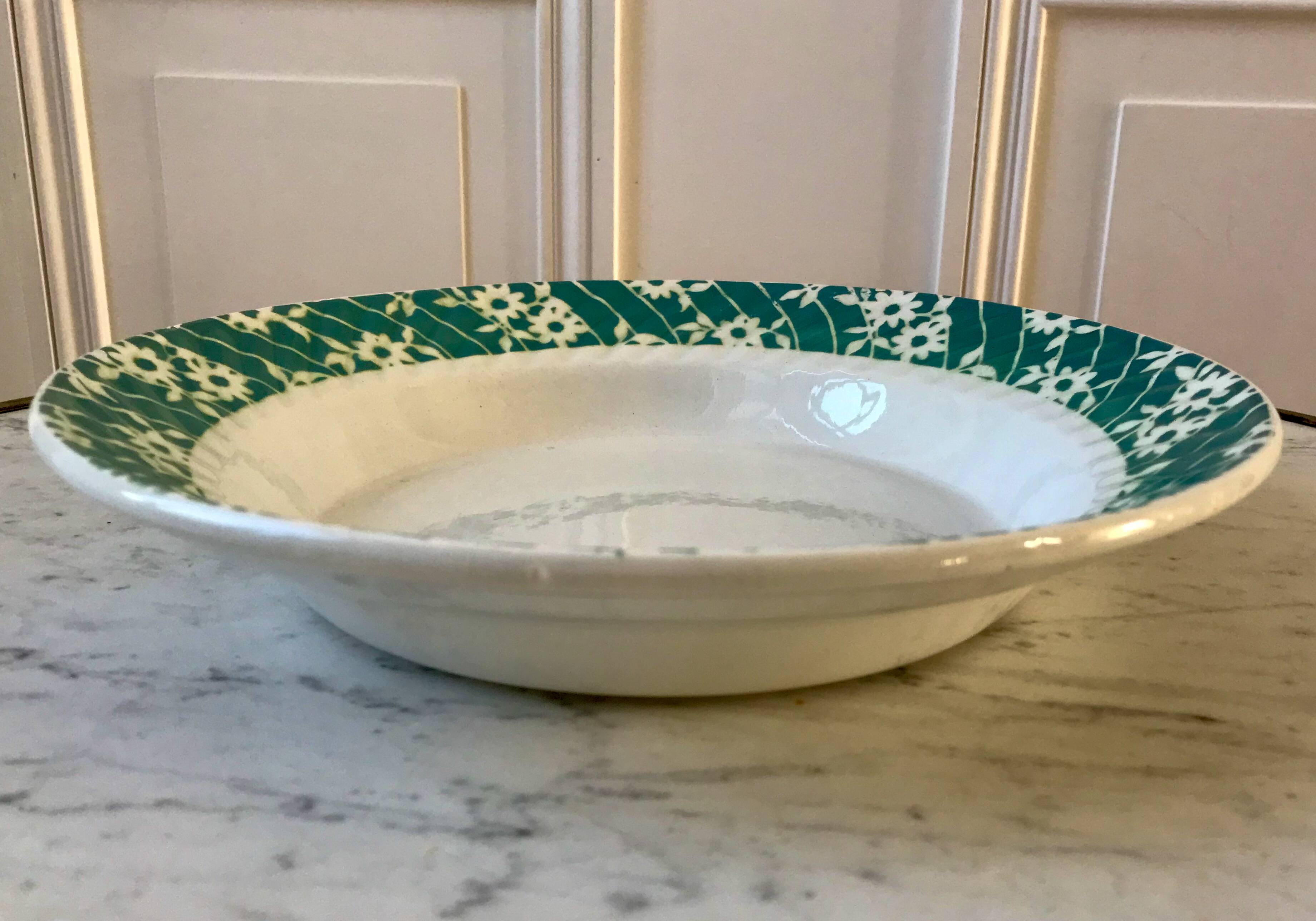 St Amand hollow dish textured white flowers on a green background, 1950s