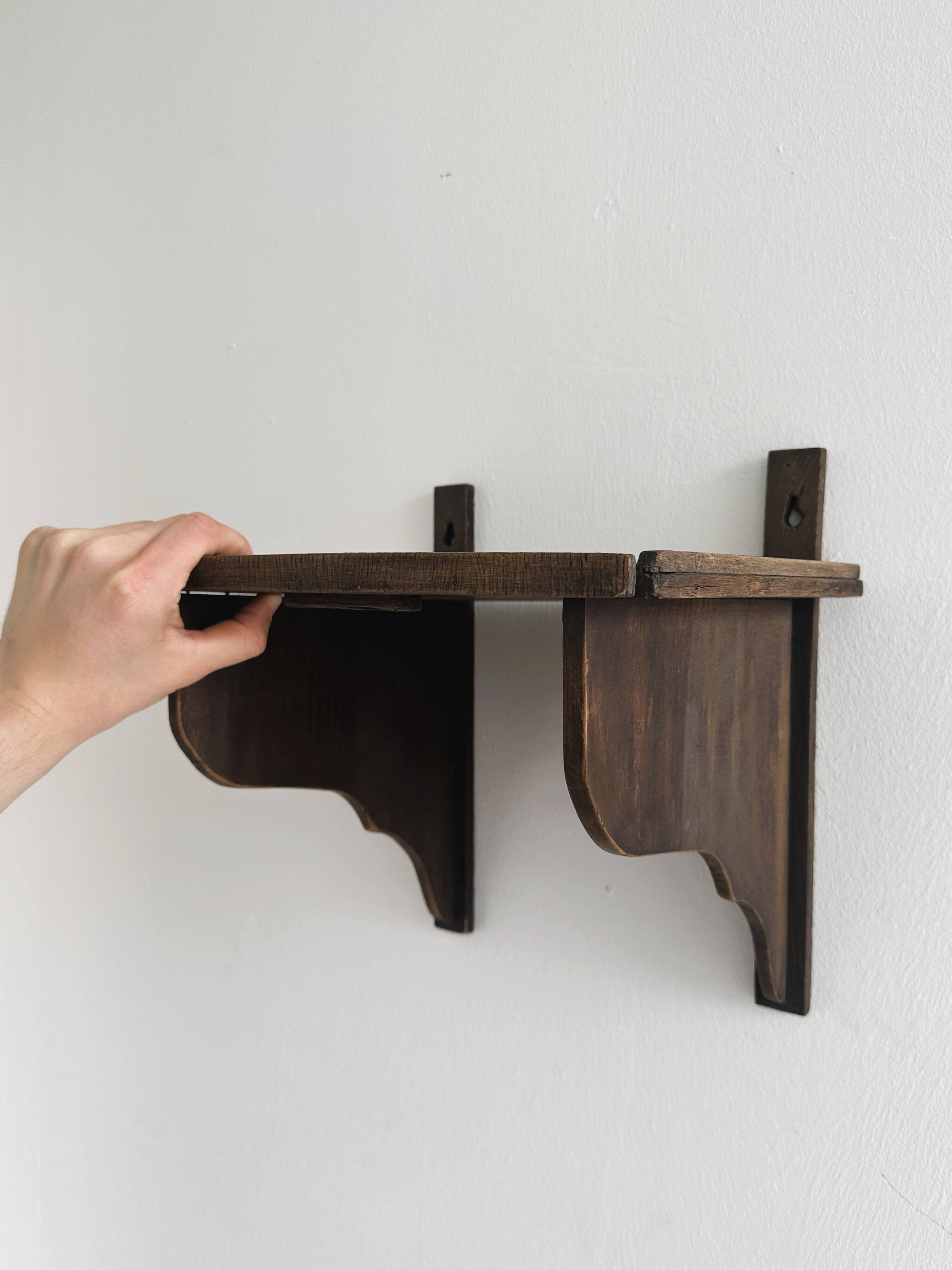 Antique wooden wall shelf.