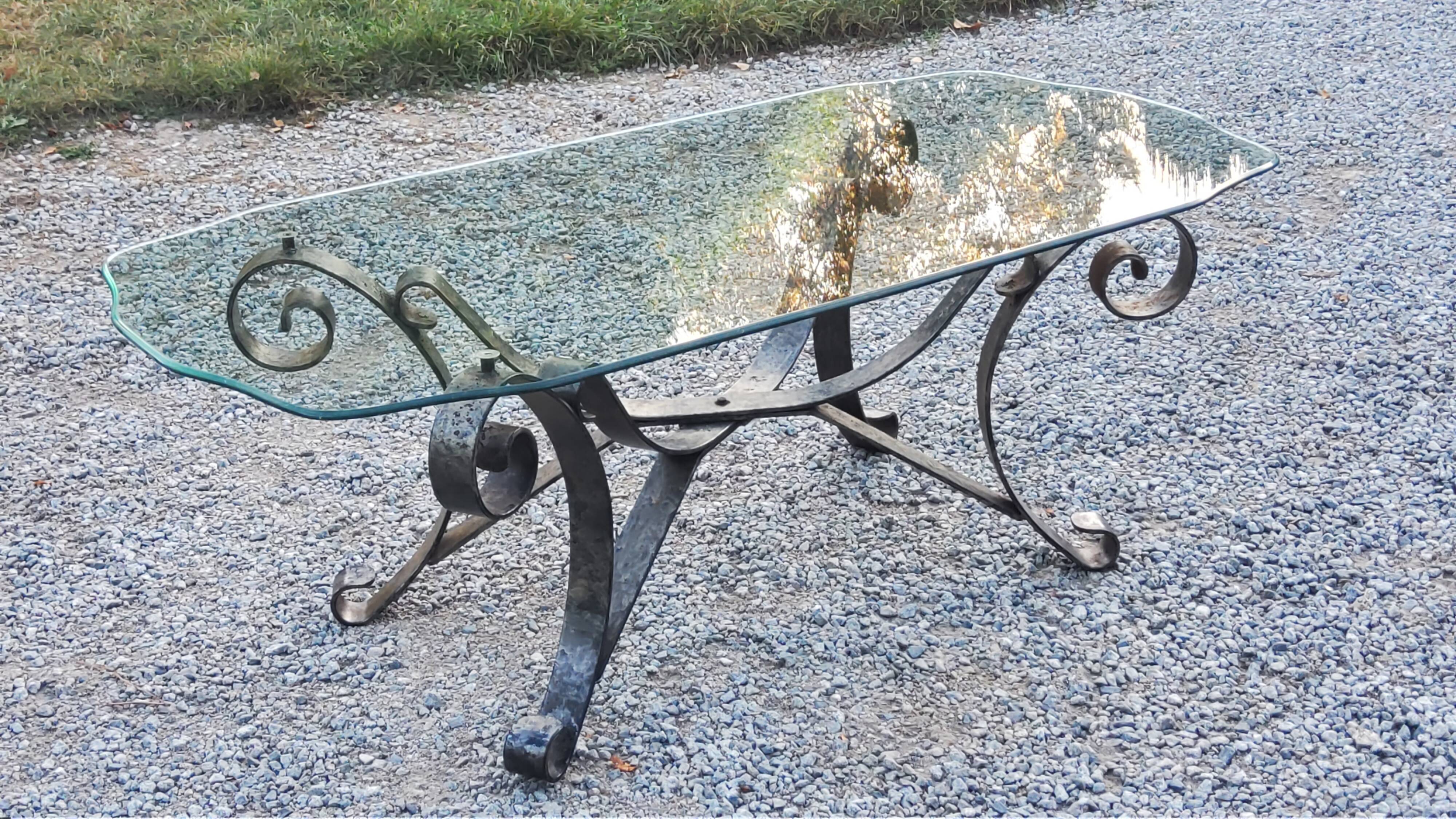Coffee table from the 70s in wrought iron glass top bec de corbin
