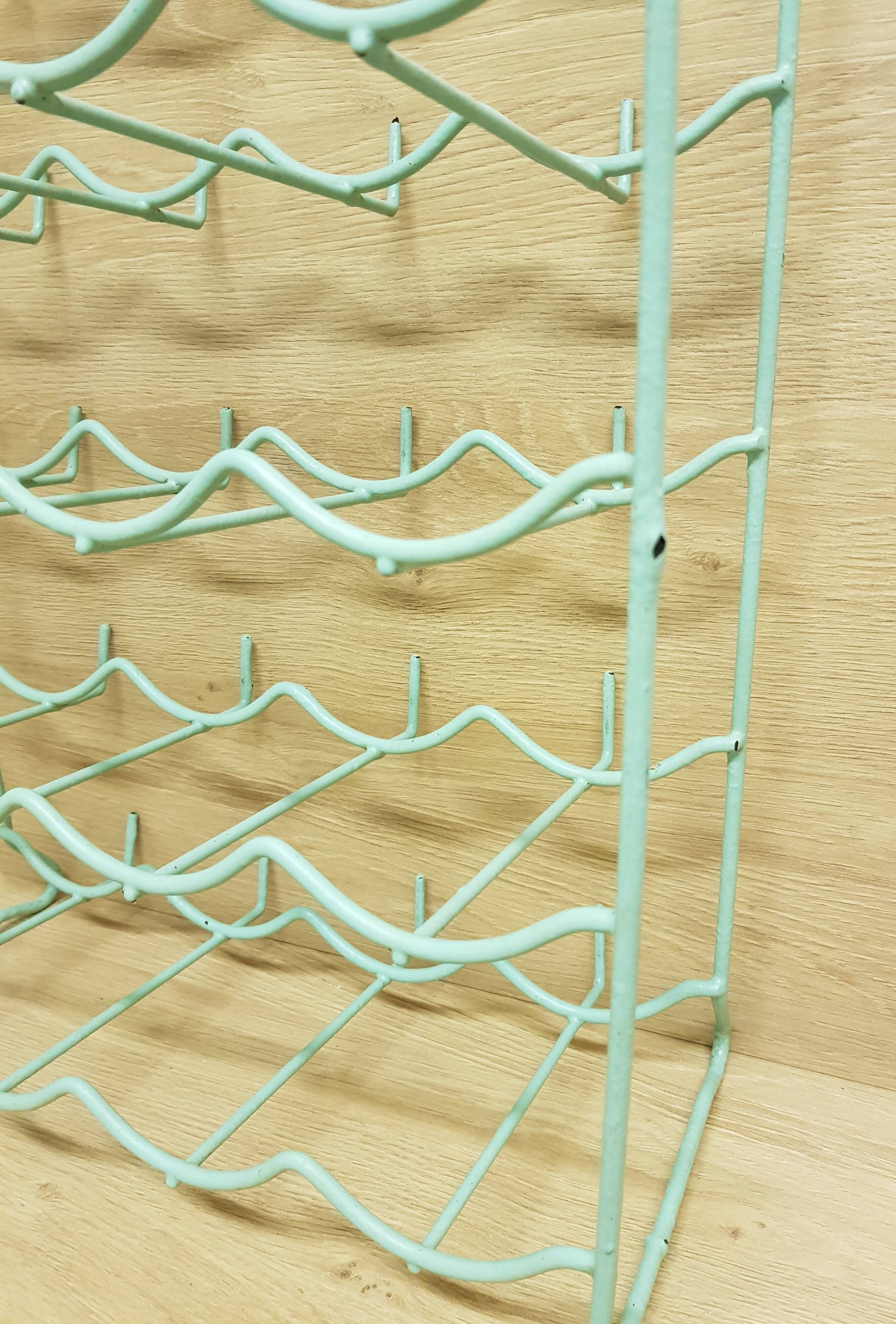 Metal aqua green bottle rack
