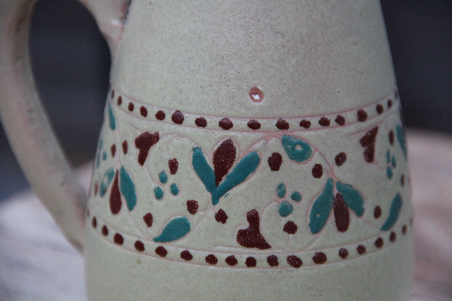 Vernified sandstone pitcher