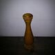 Brown wooden vase from the 1940s, turned, with an elongated silhouette and moulded base.