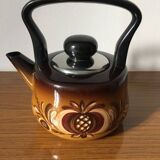 Enameled kettle with vintage stylized patterns. German brand ASTA