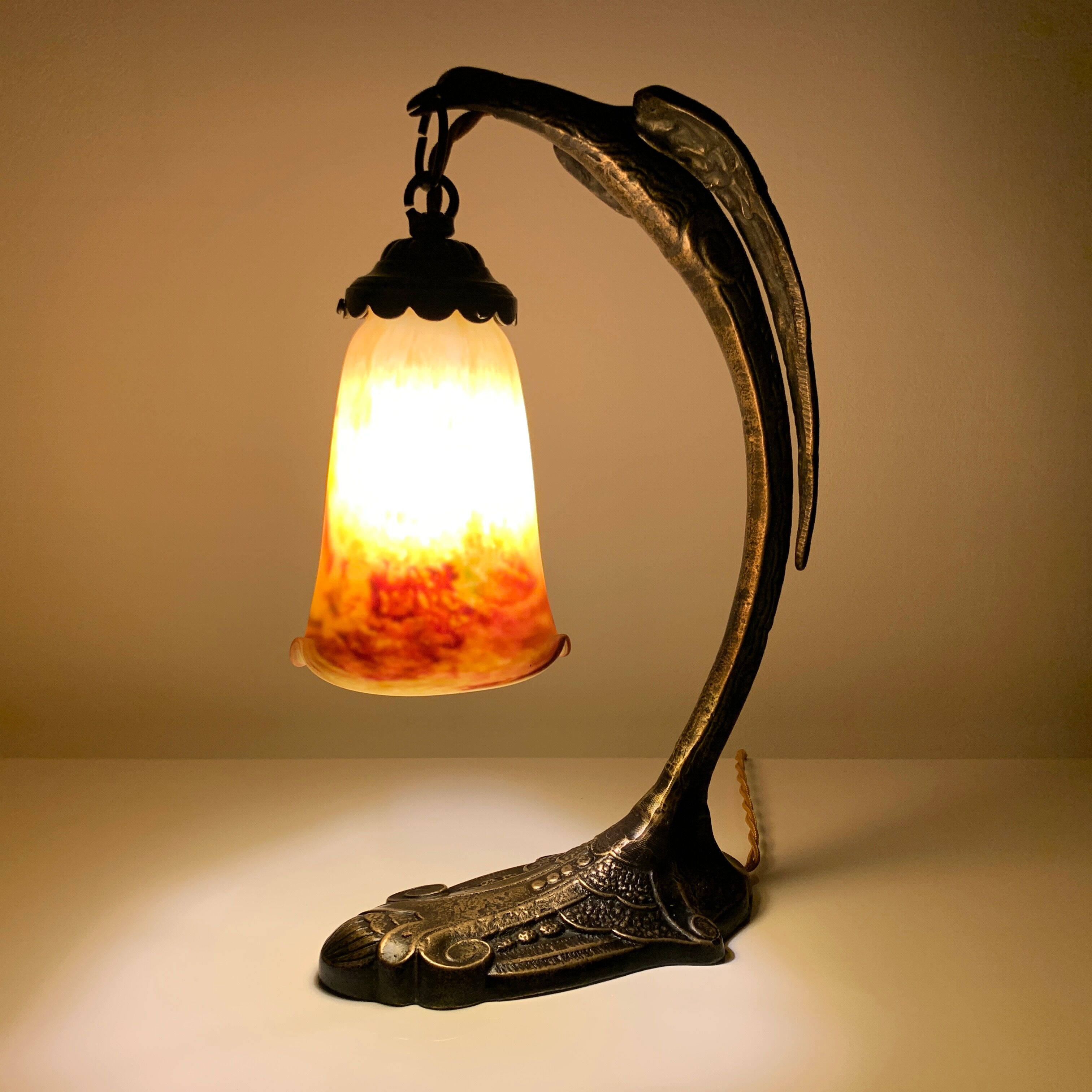 Bronze eagle lamp patinated and Art Nouveau style glass pate