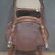 Chaise basse de style Louis XVI