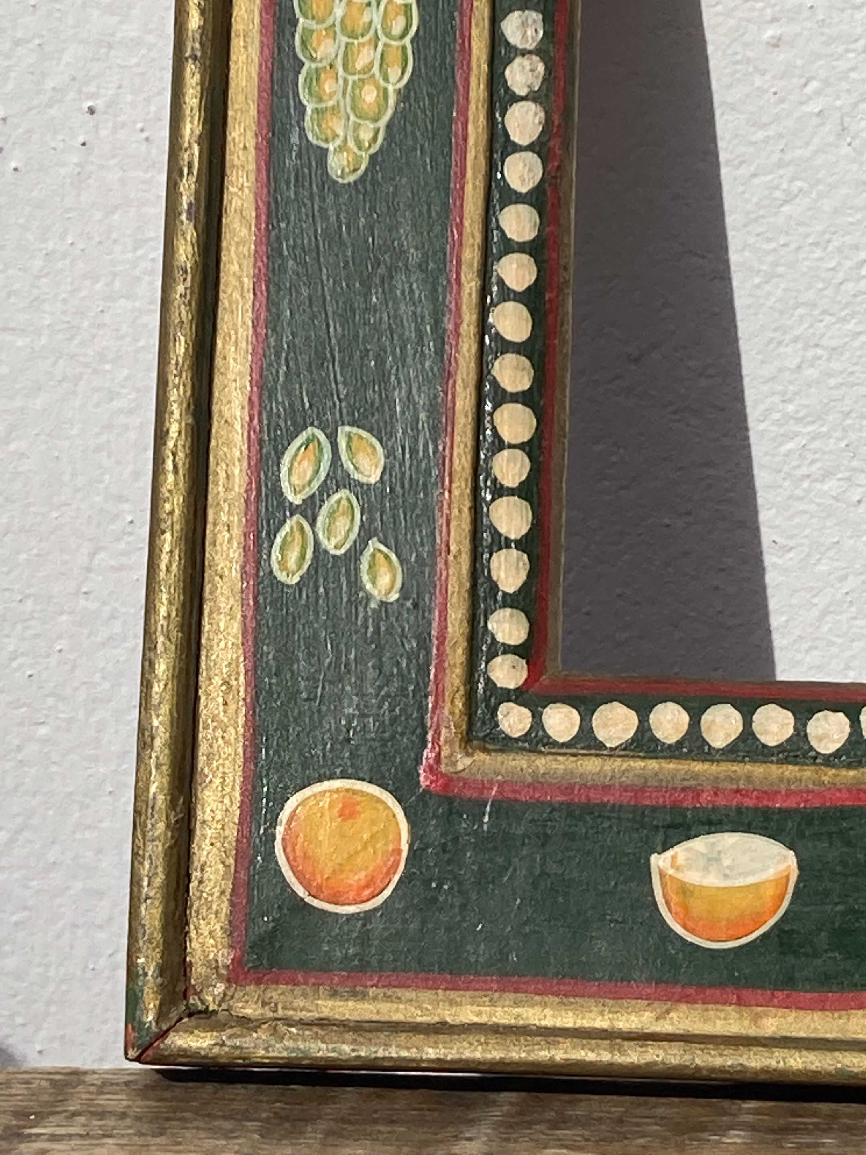 Hand-painted wooden frame with fruit decoration