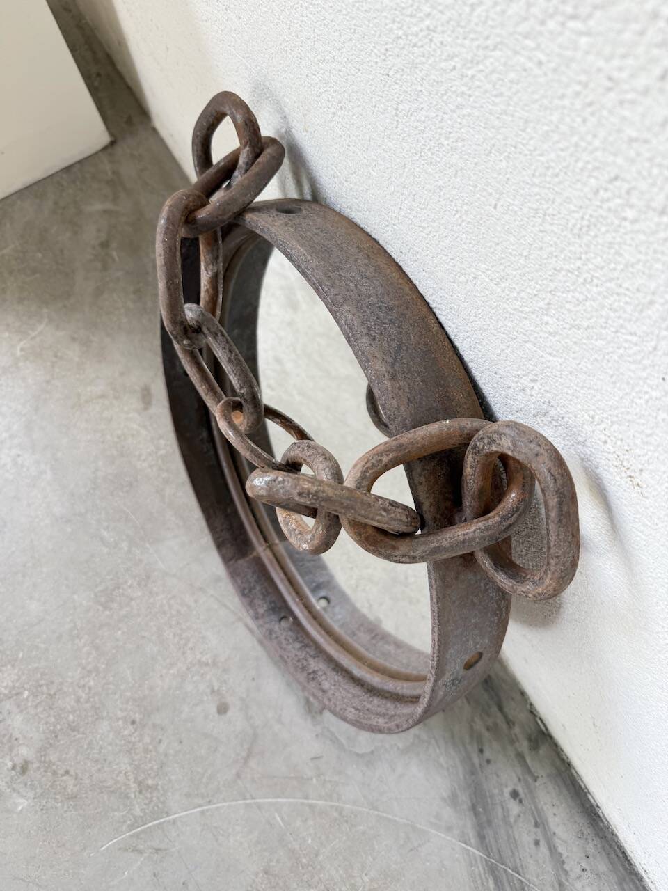 Brutalist mirror with metal chain from the 50s