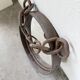 Brutalist mirror with metal chain from the 50s