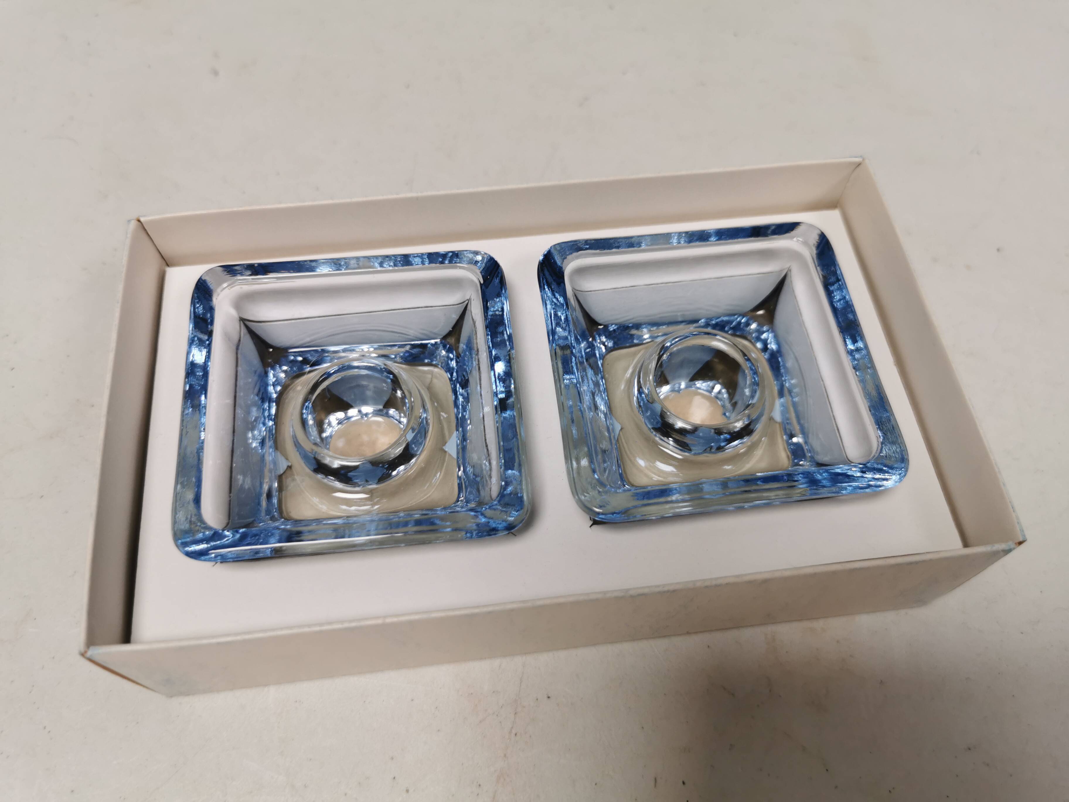 Two candleholders in turquoise/tranparent glass from Danish Kastrup-Holmegaard glassworks 1965-72