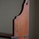 Primitive wall shelf in pine, by a Swedish upholsterer, late 19th century.