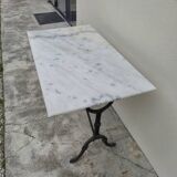 Antique cast iron and marble bistro restaurant table
