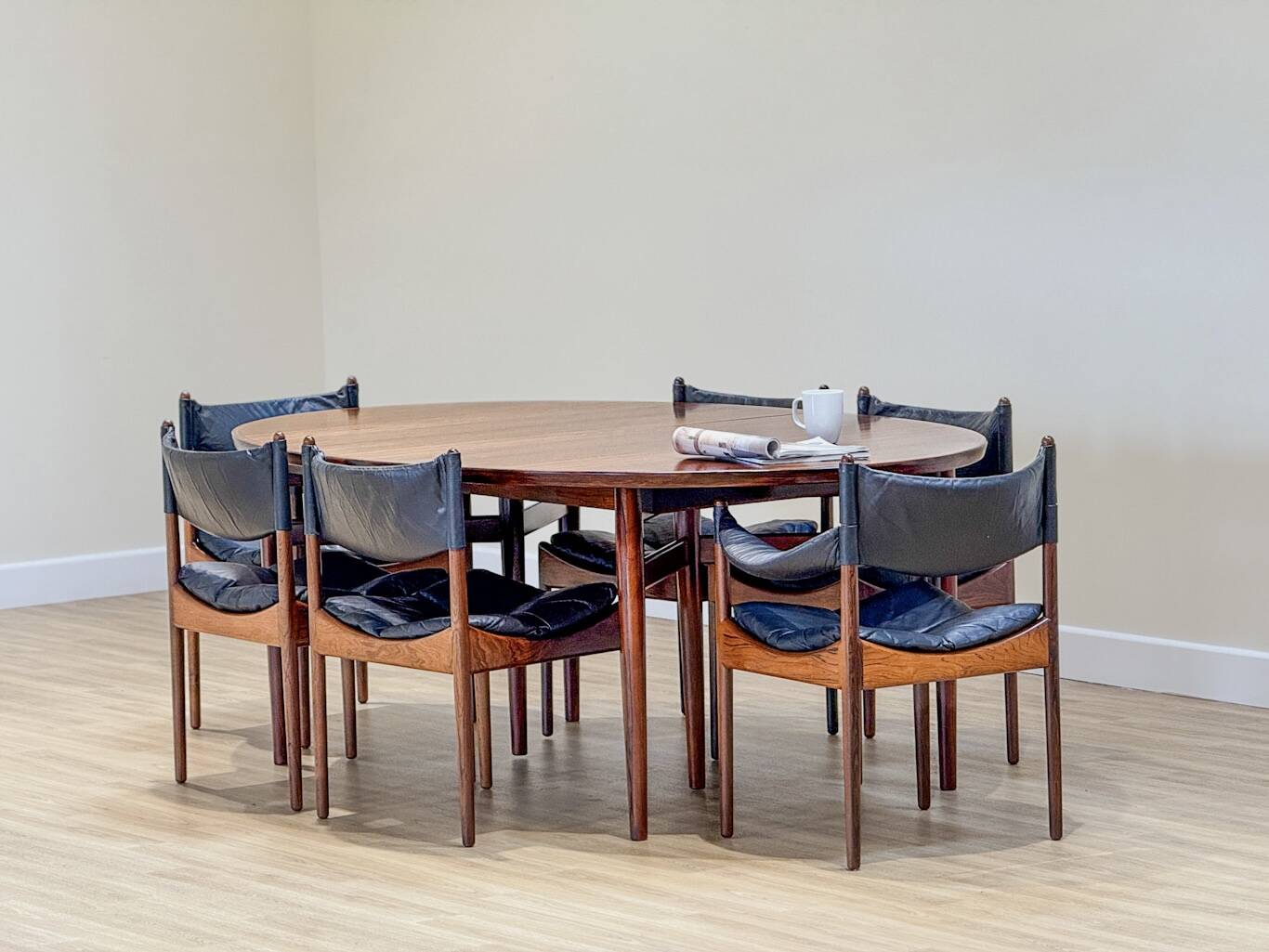 Extendable dining room table and chairs (by Kristian Solmer Vedel)